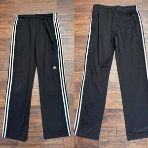 Adidas Black Joggers 3 Stripe women’s medium zip side pocket at knee & on back